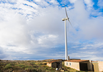 Fototapeta na wymiar Wind turbine field on the hill for renewable energy source
