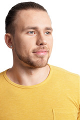 Portrait of young man posing on white background