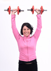 middle-aged woman with dumbbells on white background