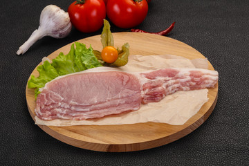Raw pork bacon