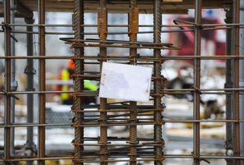 Space for writing on white sheet of paper attached to steel reinforcement