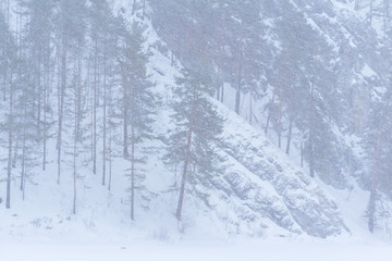 mountain landscape during a snowfall