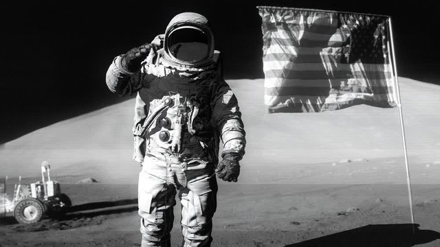 Astronaut saluting the American flag.. Some Elements of this video furnished by NASA.