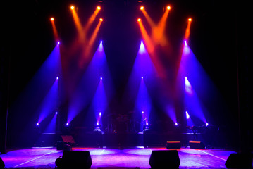 Empty stage. Multicolored lights, light show at the Concert.