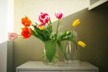 Flowers in the vase. Home sweet home. Sunny day. Beautiful spring. Bouquet on the women?s day.