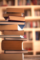 Stack books on library background
