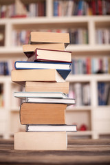 Stack books on library background