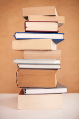 Stack books on library background