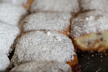 Baked stuffed cakes with marmalade and sugar. Home made. Slovakia