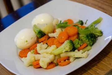 Cooked colorful vegetables with eggs on the plate. Slovakia
