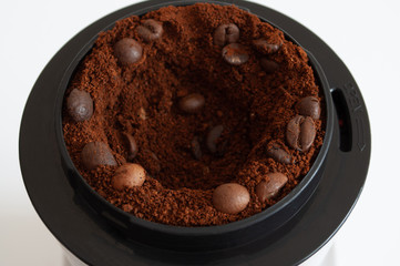 natural coffee in a coffee grinder