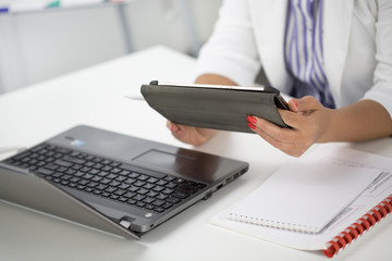 Businesswoman working at her office