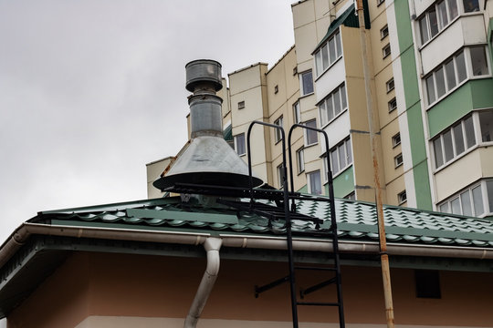 Staircase to the roof close up on sky background