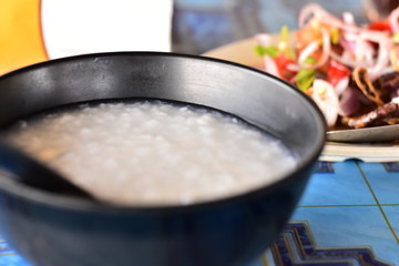 the thai rice porridge with fried dried squid
