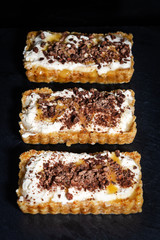 Close up of a Banoffee pie with a black background