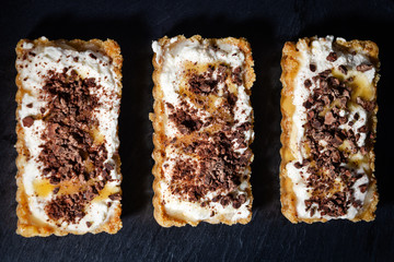 Close up of a Banoffee pie with a black background