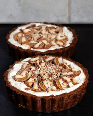 Close up of a Banoffee pie with a black background
