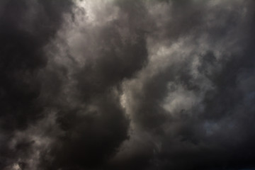 Huge gray storm clouds cover the entire sky.