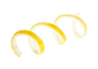 Lemon peel or lemon twist on white background