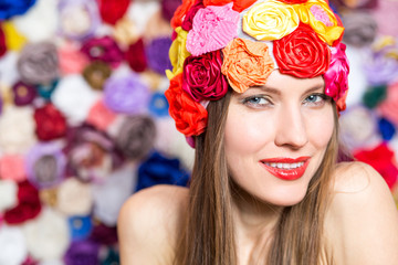  close up portrait of young happy smiling, laughing lady  over colorful floral background