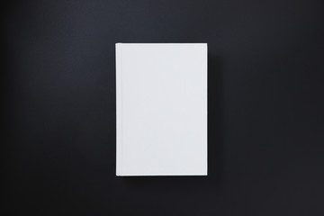 White cover book on black background