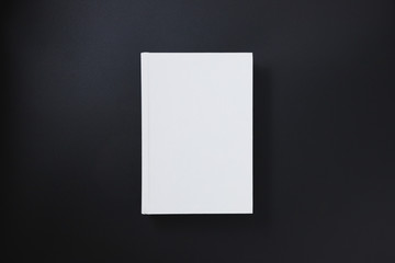 White cover book on black background