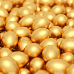 background of golden eggs