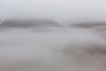 Under heavy fog mountains are hardly visible, Svalbard, Spitzbergen, Longyearbyen, Norway