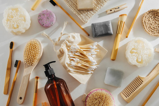 Set Of Eco Cosmetics Products And Tools. Soap, Shampoo Bottles, Bamboo Toothbrush, Natural Wooden Brush. Zero Waste, Plastic Free. Sustainable Lifestyle Concept.