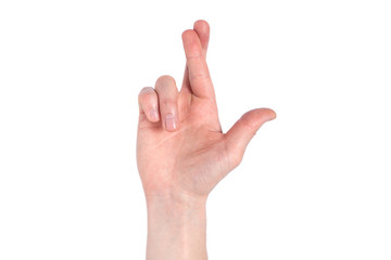 Finger crossed hand sign, good luck symbol isolated on white. Crossed fingers on a white background