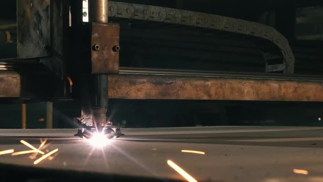 Close-up Metal Cutting Machine Cuts Parts For Decoration