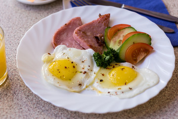 scrambled eggs with vegetables and sausage with coffee
