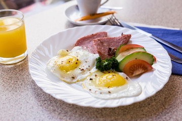 scrambled eggs with vegetables and sausage with coffee