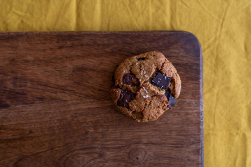 Fototapeta na wymiar paleo chocolate chunk tahini cookie. salty cookie.