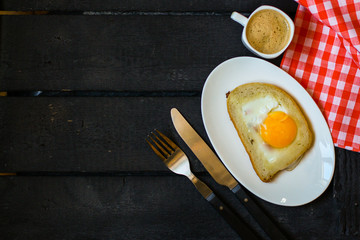 fried eggs in bread, sandwich, scrambled eggs (yolk and white) sandwich. food background