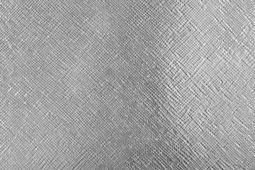 Fototapeta na wymiar Background with foil silver leather material, close up – photo image