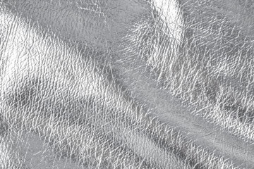 Background with silver textile material, close up – photo image