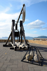 Catapult in the historical center of Alghero, Sardinia, Italy