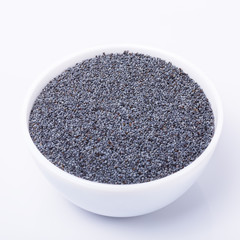 Dry poppy seeds isolated on white background