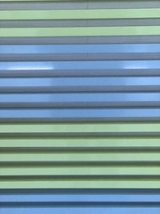 Green and Blue Stripe Pattern from a Wall