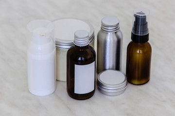 Cosmetic bottles and containers with blank label