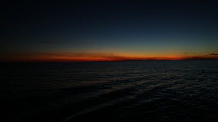 Fototapeta na wymiar Ocean and Sky During Twilight Hour