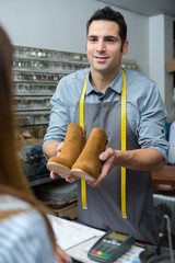 male shoes with shoemaker tools