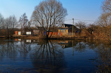 Fototapeta na wymiar Panorama landscape windmills on water canal in village.
