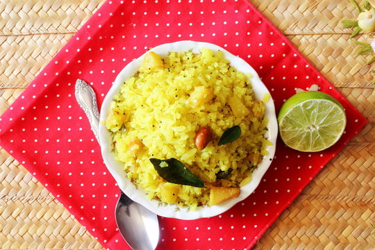 indian traditional breakfast food  potato poha or batata poha spicy snack