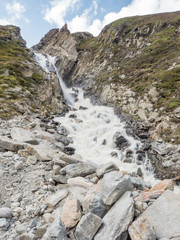 Mountain waterfall  near the Dresdenerhutte at the end of the Stubai Valley (Stubaital), Alps, Tyrol, Austria, Europe