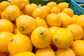 A pile of lemons as a background (texture)