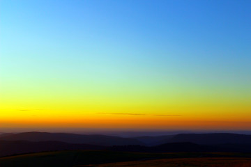 Obraz na płótnie Canvas coucher de soleil sur la montagne vosgienne depuis le sommet du hohneck