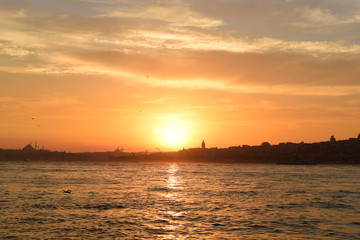 Obraz premium Orange color sunset in Istanbul bosphorus