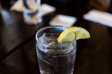 Glass of water in black table